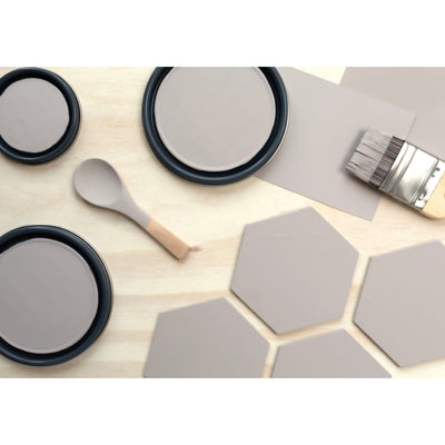 Gray Chocolate Milk DE 6059 flatlay with wood hexagons, wooden spoon and paint can lids painted