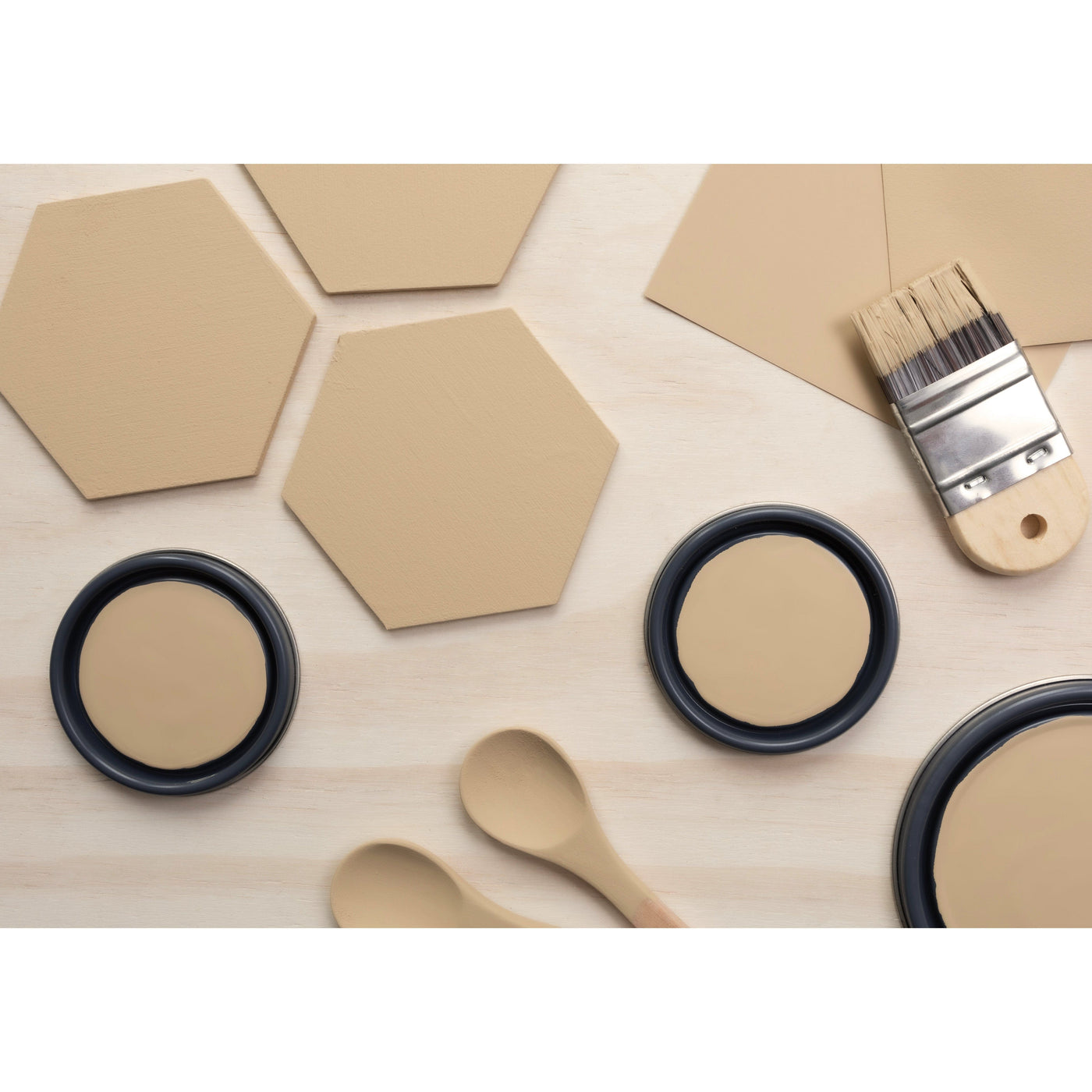 wood hexagons, small paint brush, paint lids and wooden spoons all painted in Adobe